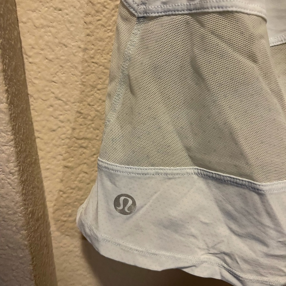 Women’s Large Lululemon Athletica tank with mesh chevron detail.